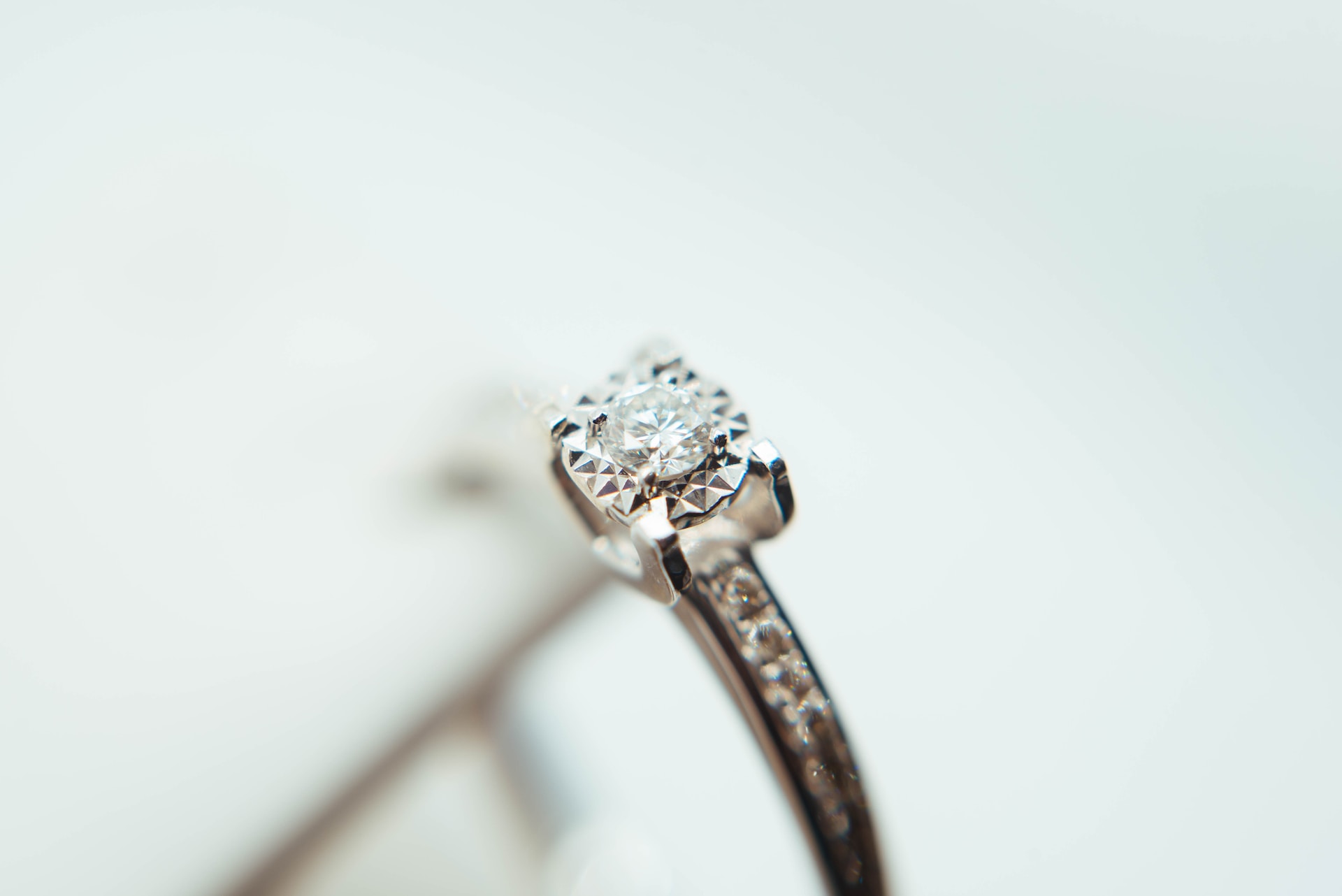 a close up of a diamond engagement ring
