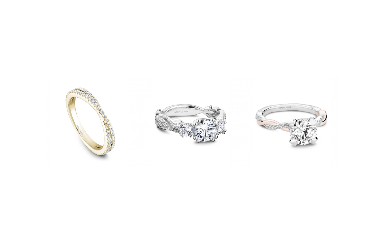 A Noam Carver yellow gold wedding band, a white gold engagement ring, and a white gold with rose gold detailing on an engagement ring