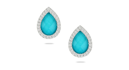 a pair of turquoise stud earrings featuring diamond halos