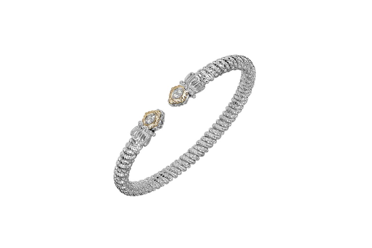 A sparking diamond fashion bracelet with a rope like texture and some gold accents.