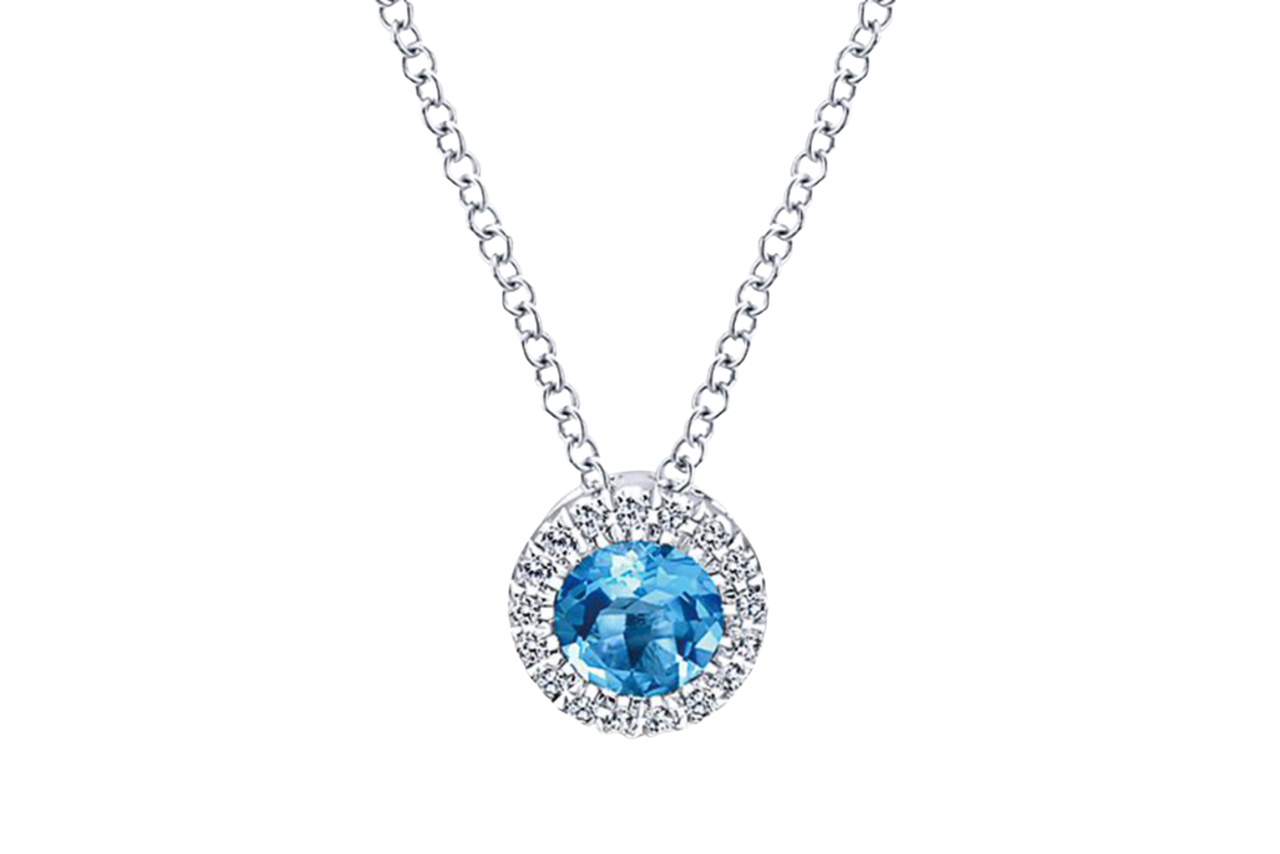 A stunning blue pendant necklace with a diamond halo and a circular center stone.