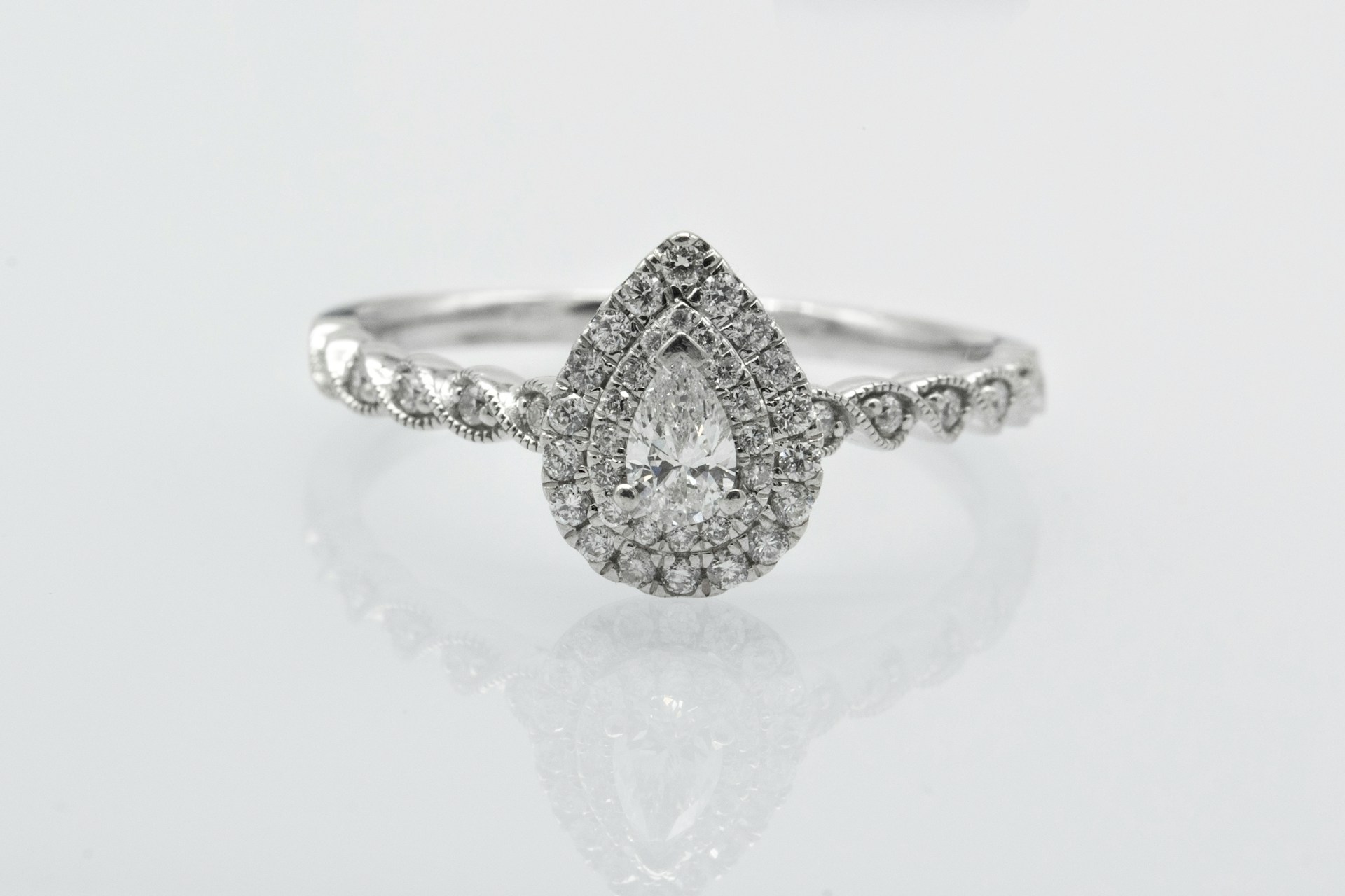 pear shape halo engagement ring