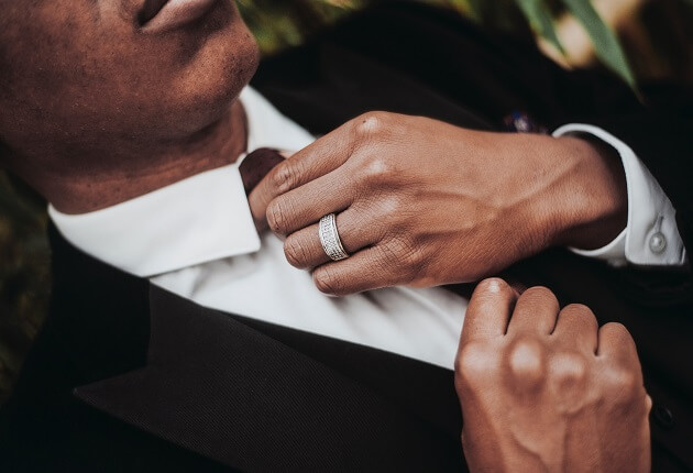 Dapper Man in Suit With Wedding Band Dapper Man in Suit With Wedding Band