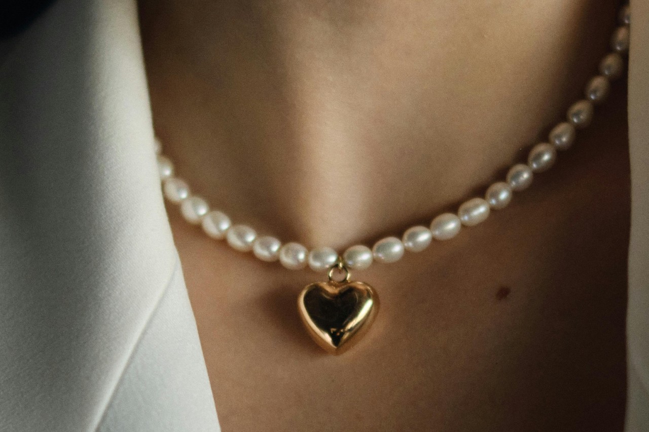pearl necklace with a heart-shaped pendant pearl necklace with a heart-shaped pendant